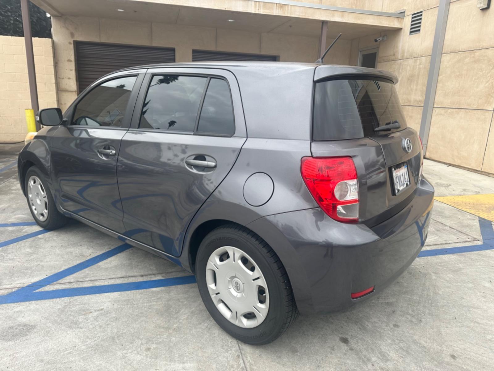 2009 Gray /Black Scion xD 5-Door (JTKKU104X9J) with an 1.8L L4 DOHC16V engine, automatic transmission, located at 30 S. Berkeley Avenue, Pasadena, CA, 91107, (626) 248-7567, 34.145447, -118.109398 - The 2009 Scion XD 4-Door Hatchback is a compact, versatile, and stylish vehicle that offers an exceptional driving experience. Located in the heart of Pasadena, CA, our dealership specializes in a comprehensive selection of used BHPH (Buy Here Pay Here) cars, including the dynamic Scion XD. This veh - Photo #2